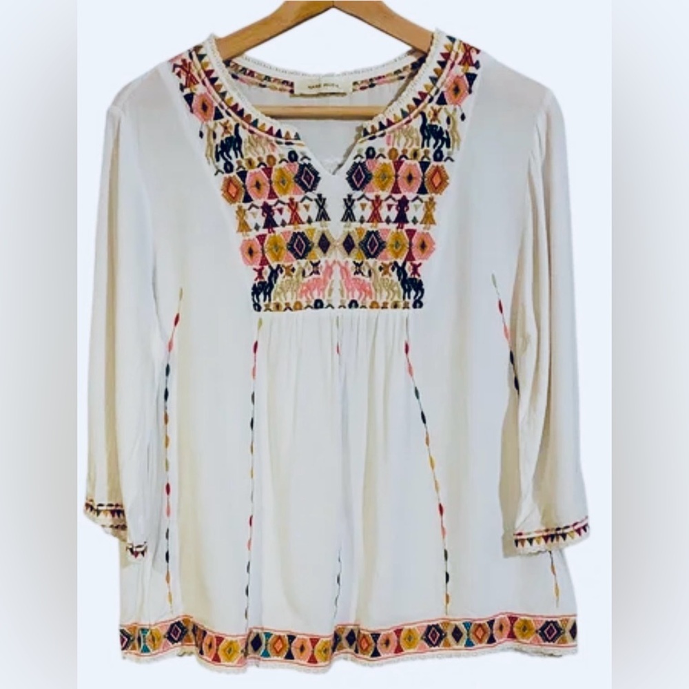 Nare Moda Embroidered long sleeve top Sold by Anthropologie